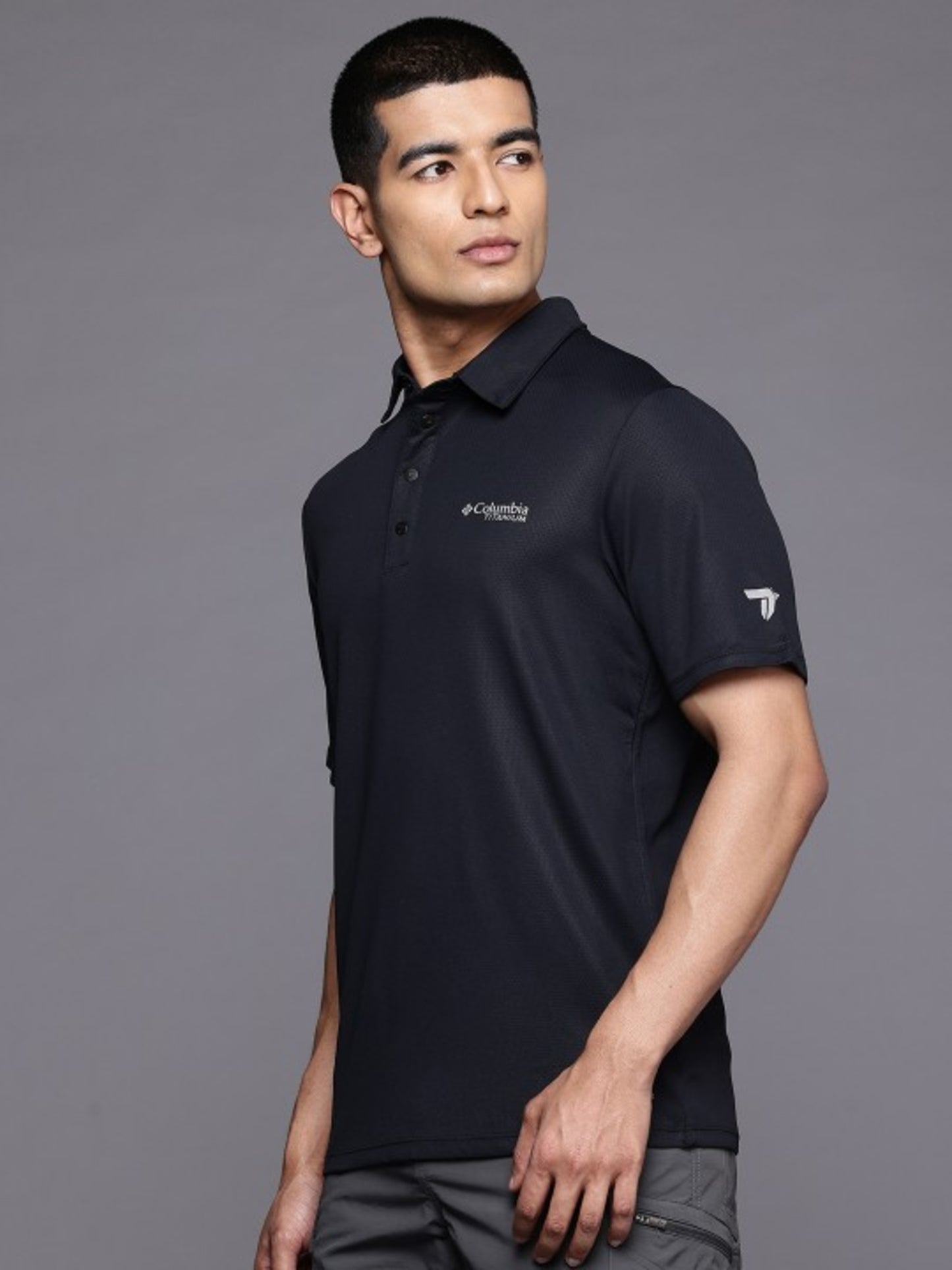 A Men Wearing Columbia Men Black Summit Valley Polo (Sun Protection)