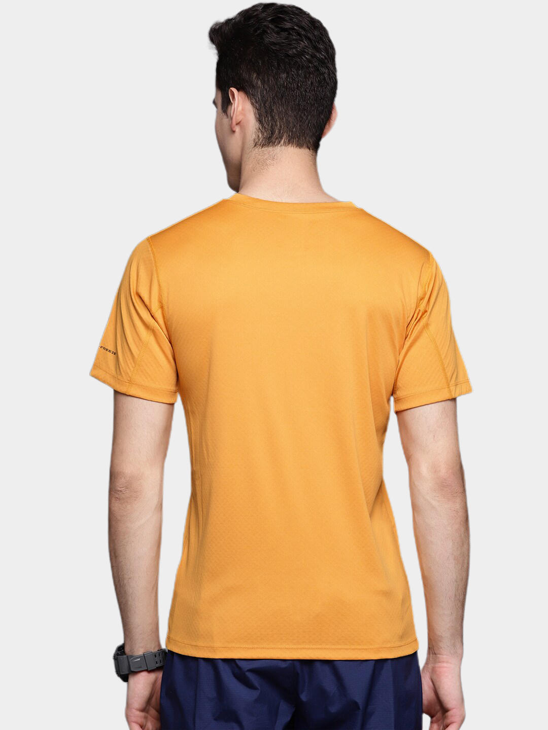 A Men Wearing Columbia Men Yellow Zero Rules Short Sleeve Shirt (Sun Protection)