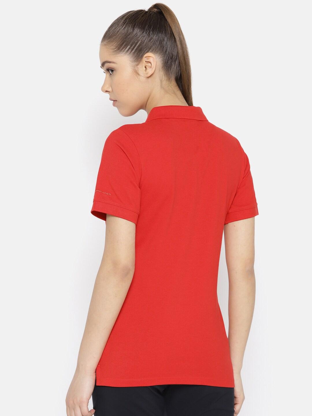 A Women Wearing Columbia Women Red Cascade Range Solid Polo (Sun Protection)