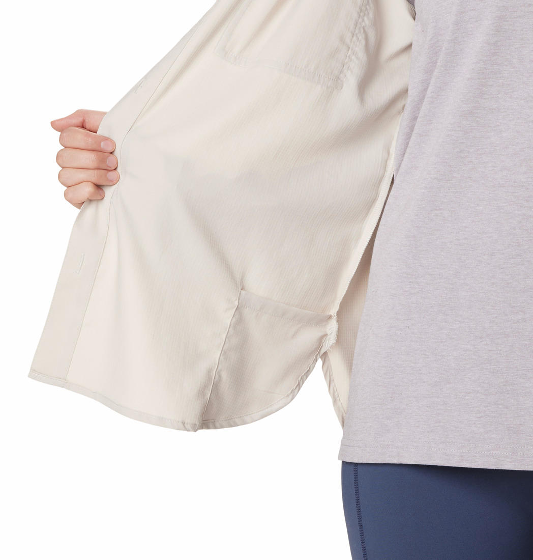 A Women Wearing Columbia Women Brown Silver Ridge Utility LS Shirt (Sun Protection)