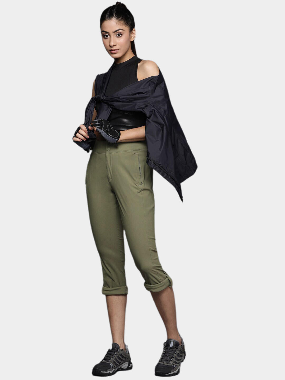 A Women Wearing Columbia Women Green Firwood Core Pant (Sun Protection)