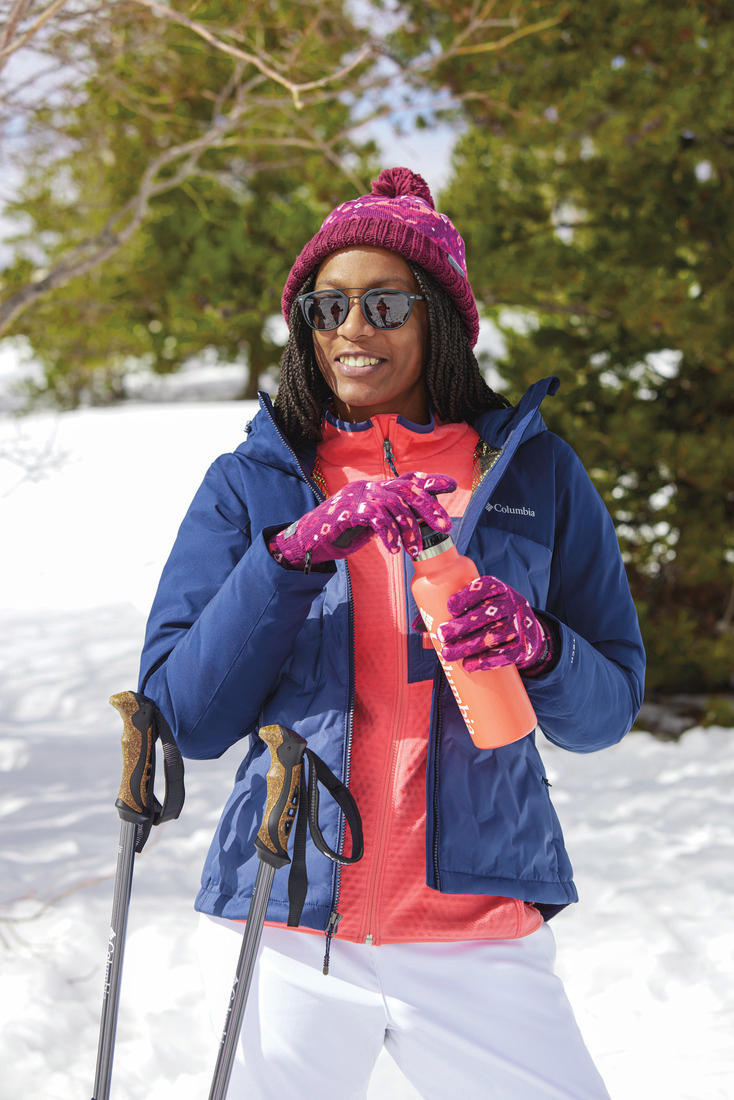 A Women Wearing Columbia Women Pink W Outdoor Tracks Full Zip