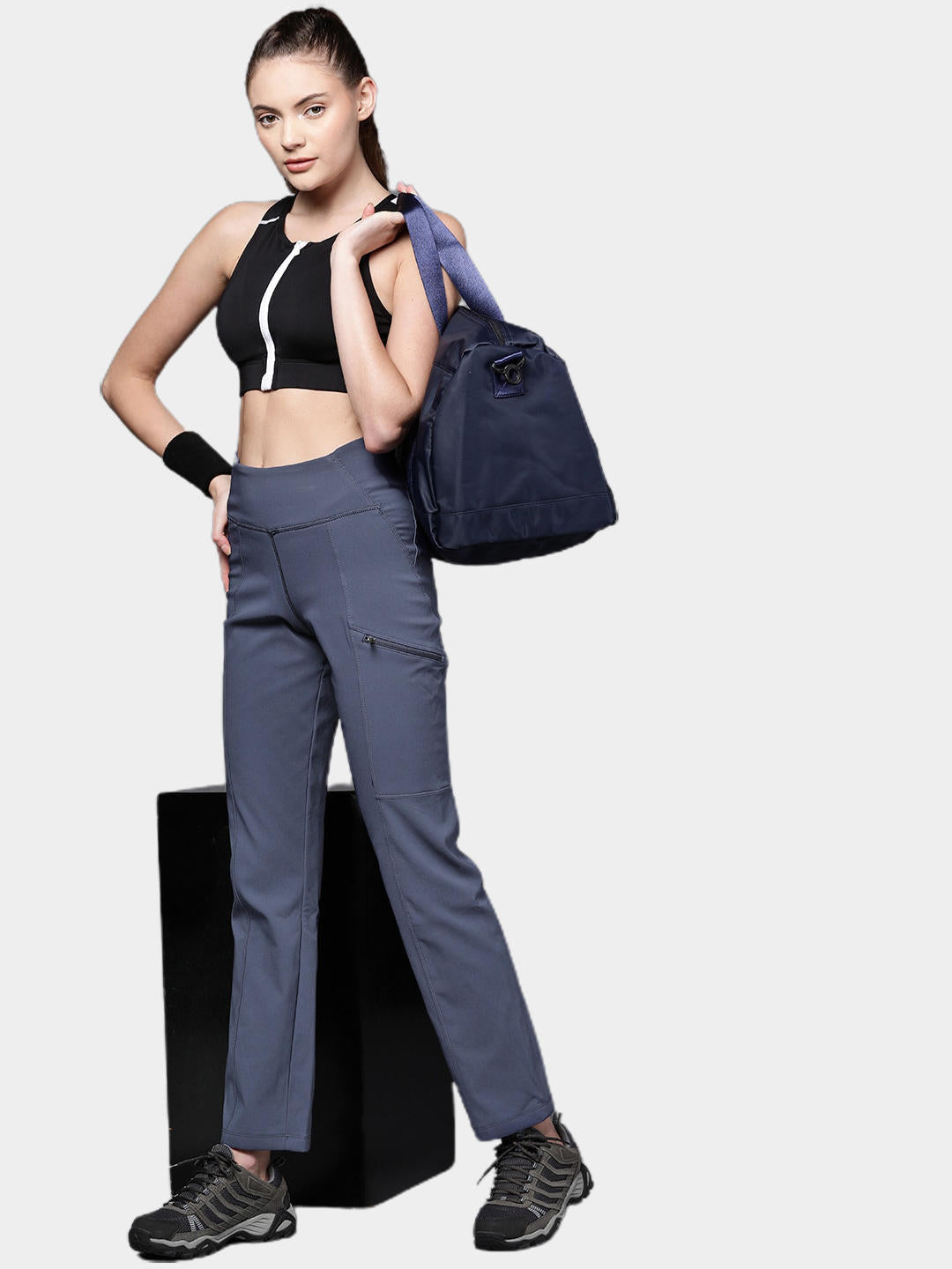 A Women Wearing Columbia Women Navy Blue Back Beauty Highrise Warm Winter Pant (Sun Protection)