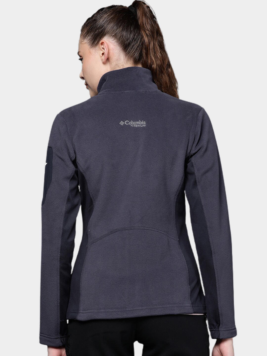 A Women Wearing Columbia Women Navy Blue Titan Pass 2.0 II Fleece
