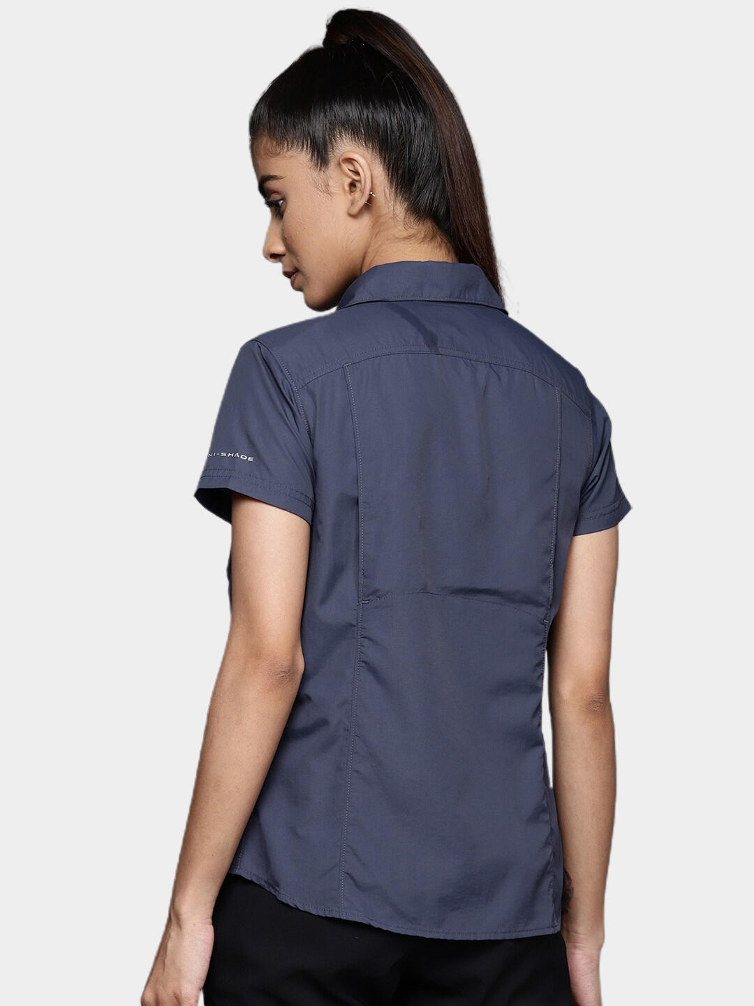 A Women Wearing Columbia Women Navy Blue Silver Ridge 2.0 Short Sleeve (Sun Protection)