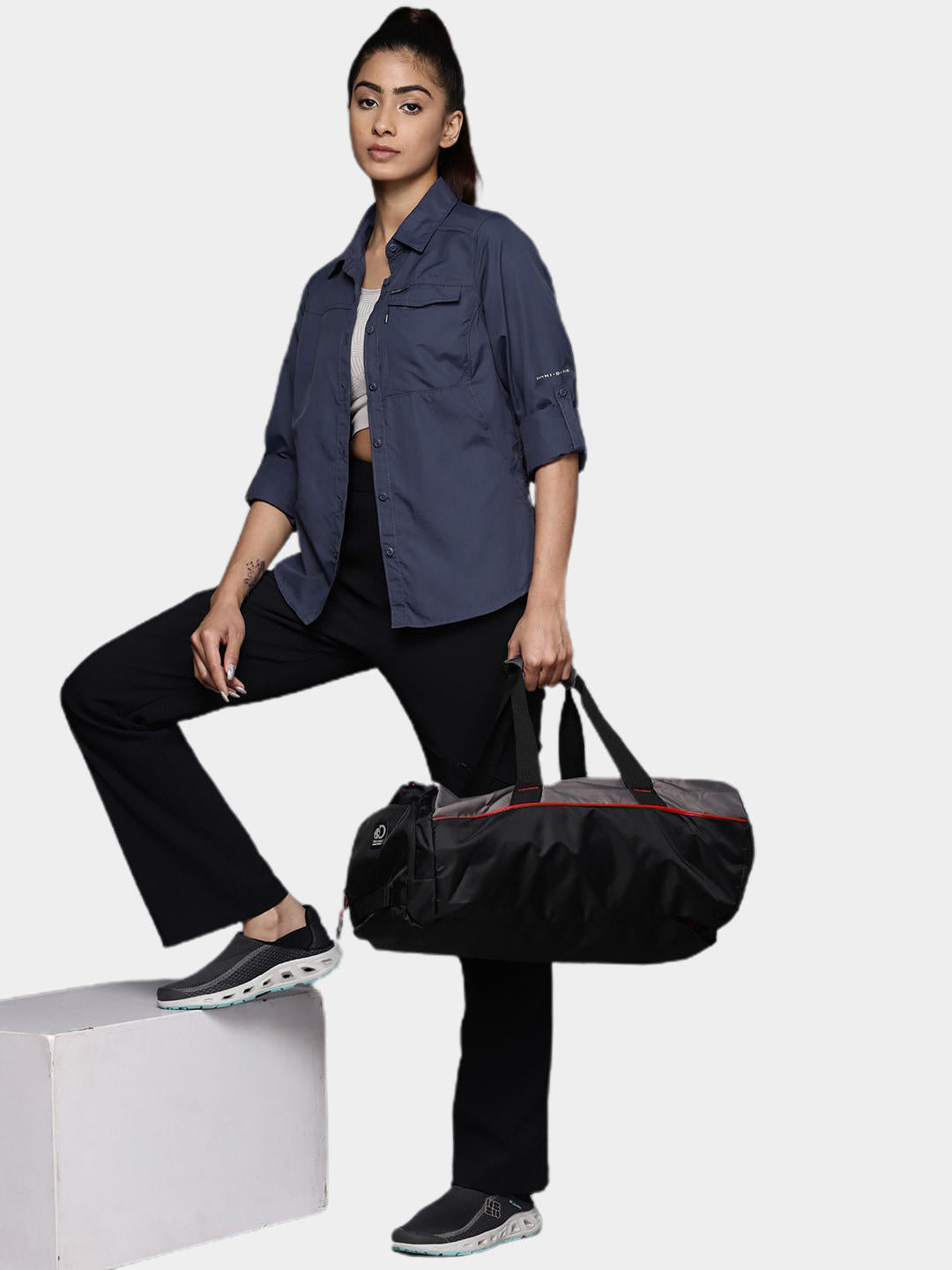 A Women Wearing Columbia Women Navy Blue Silver Ridge 2.0 Long Sleeve (Sun Protection)