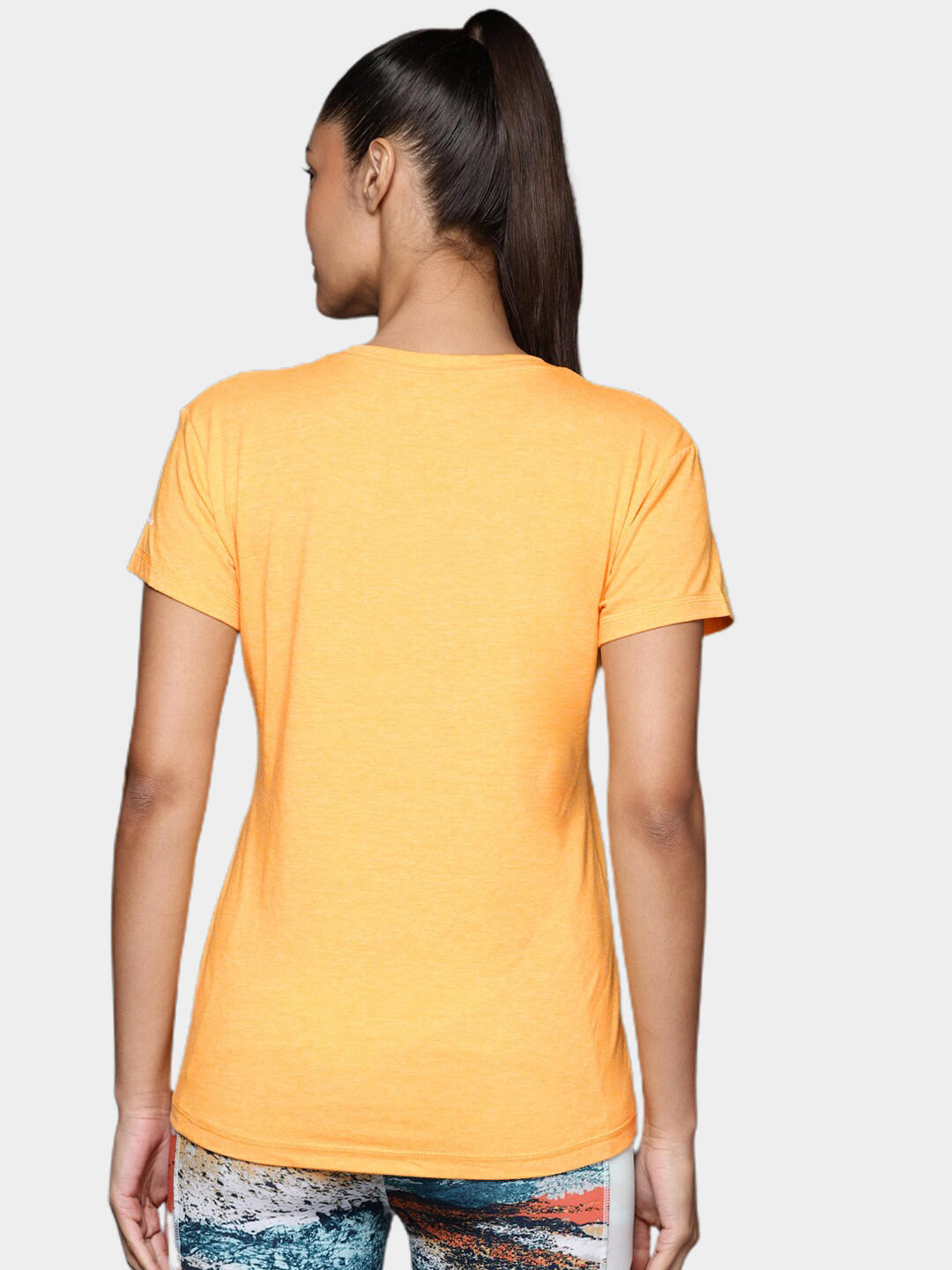 A Women Wearing Columbia Women Yellow Sun Trek SS Tee (Sun Protection)