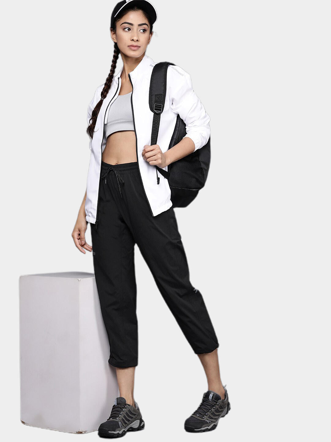 A Women Wearing Columbia Women Black W Titan Pass Lightweight Pant (Sun Protection)