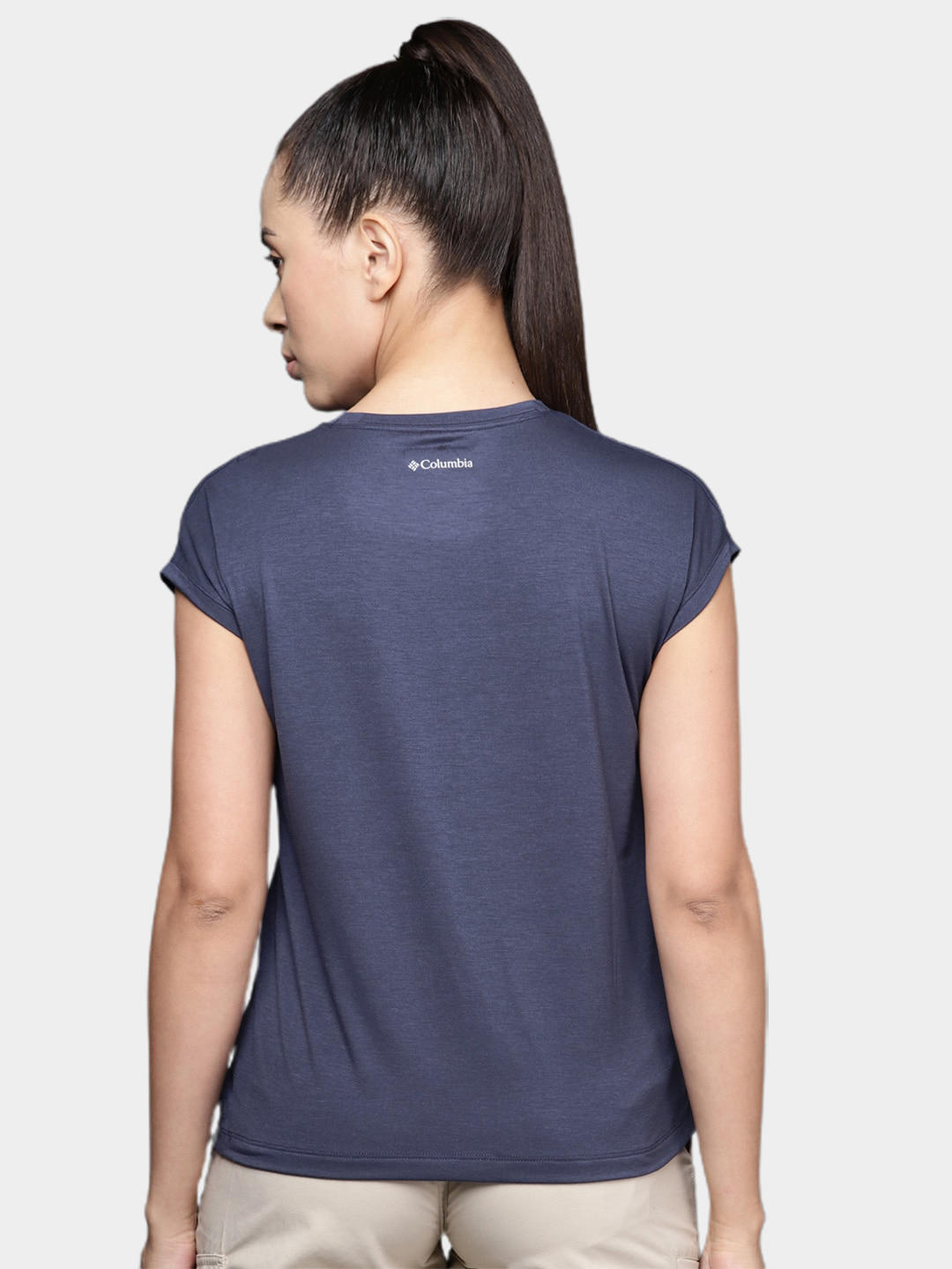 A Women Wearing Columbia Women Navy Blue Boundless Trek Short Sleeve Tee