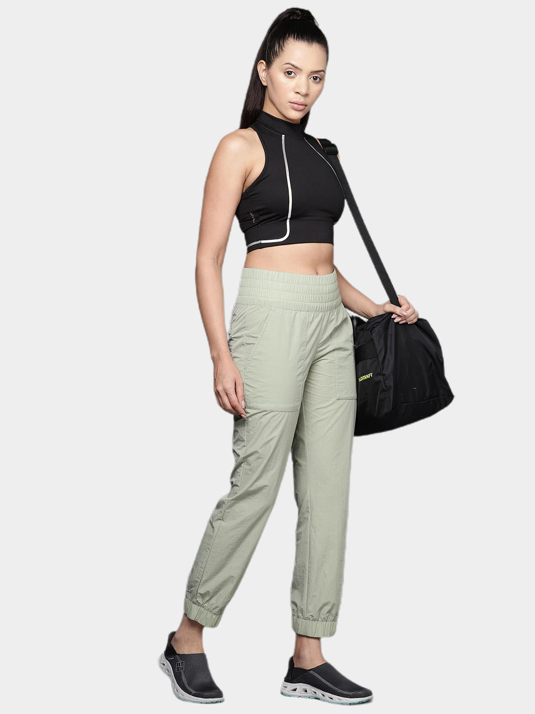 A Women Wearing Columbia Women Green Boundless Trek Jogger