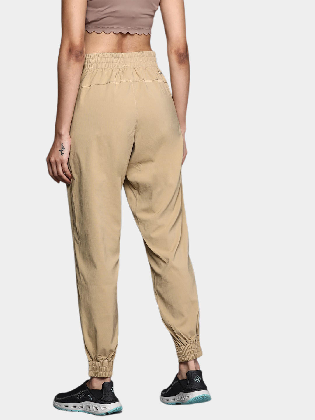 A Women Wearing Columbia Women Brown On The Go Jogger (Sun Protection)