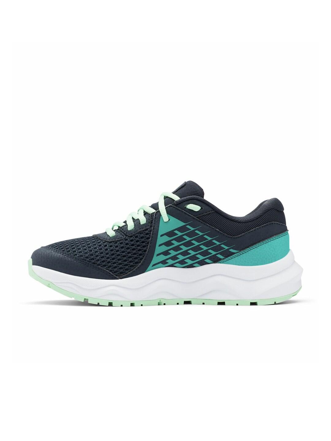A Women Wearing Columbia Women Navy Blue TRAILSTORM BEYOND