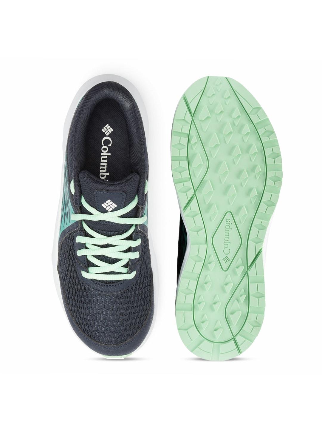 A Women Wearing Columbia Women Navy Blue TRAILSTORM BEYOND