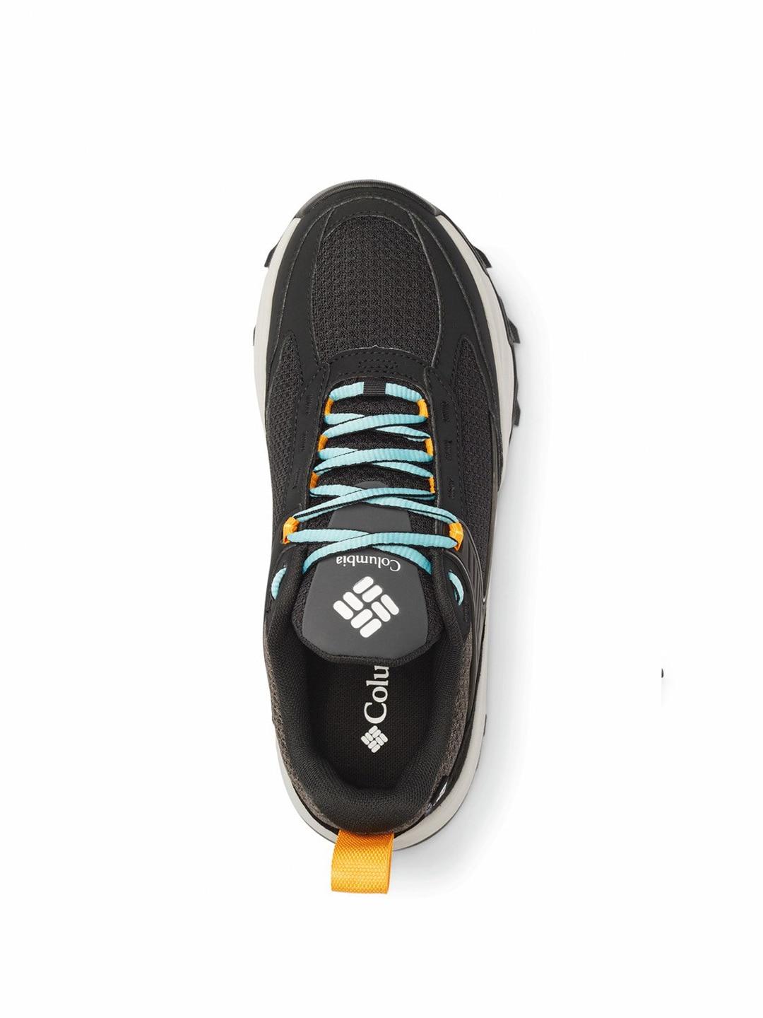 A Women Wearing Columbia Women Black HATANA MAX OUTDRY