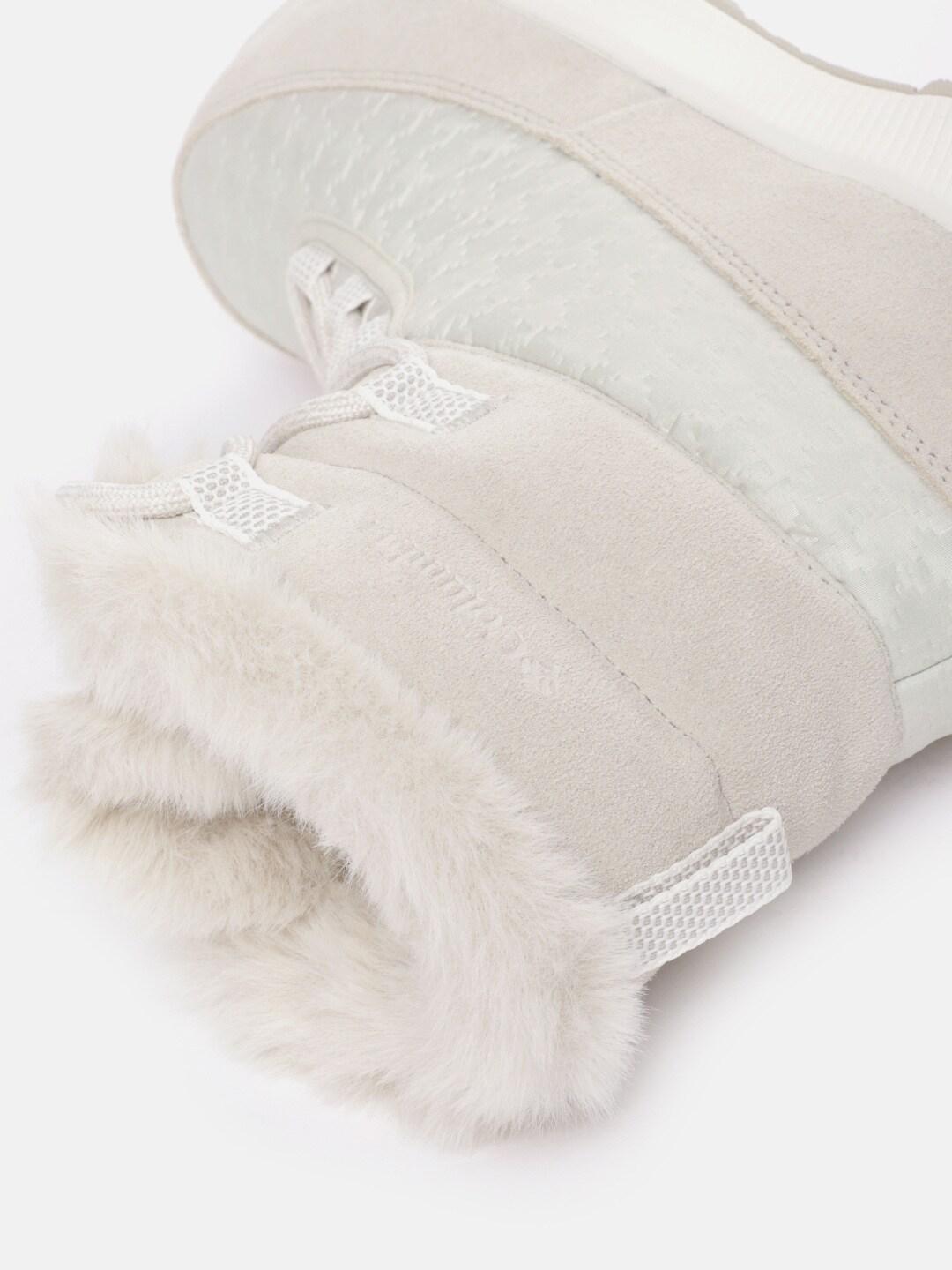 A Women Wearing Columbia Women Brown SLOPESIDE PEAK LUXE