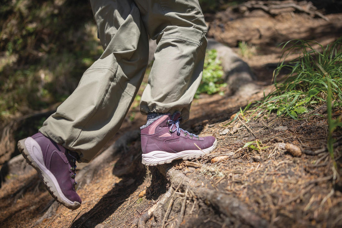 A Women Wearing Columbia Women Red NEWTON RIDGE WP OMNI-HEAT II