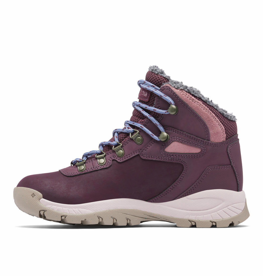 A Women Wearing Columbia Women Red NEWTON RIDGE WP OMNI-HEAT II