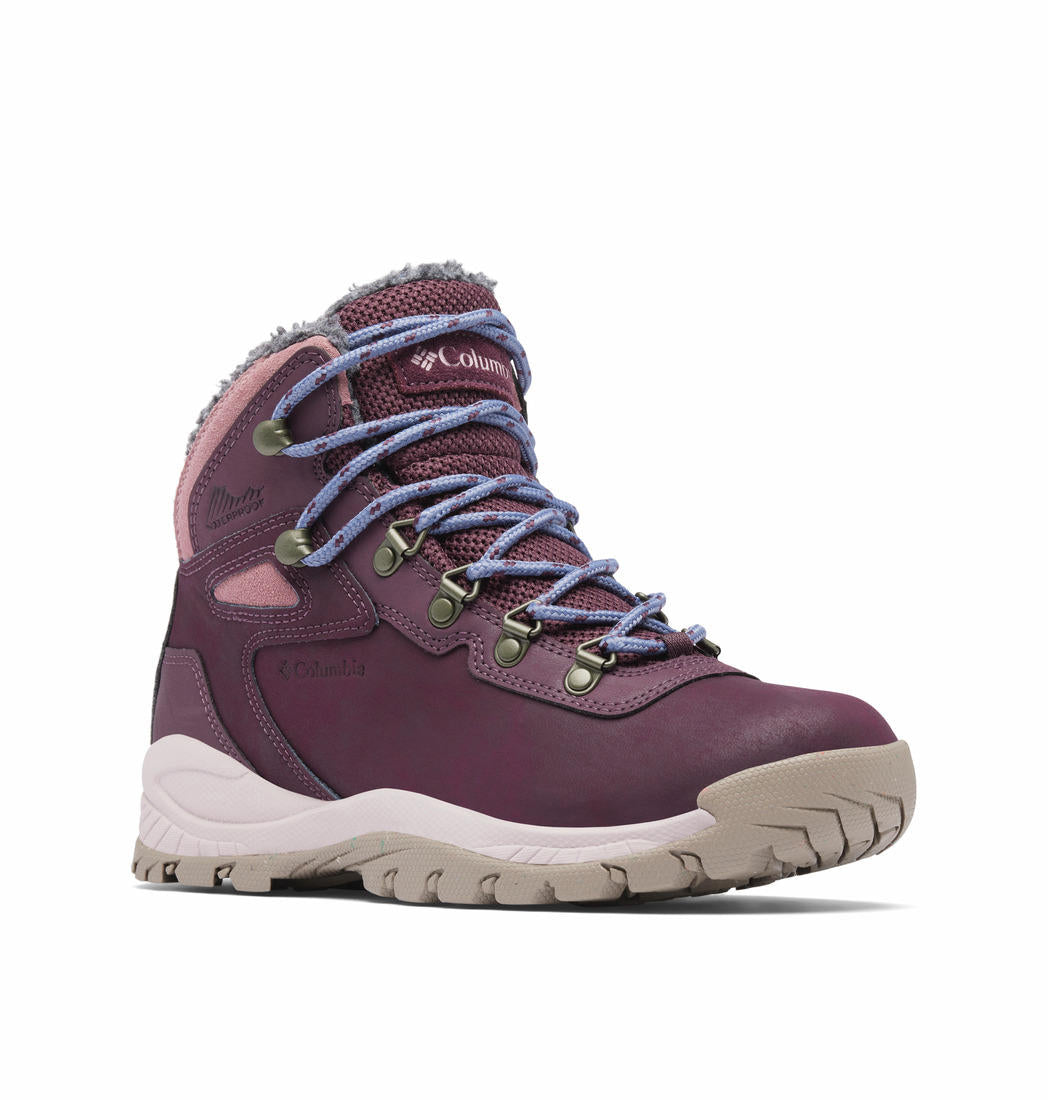A Women Wearing Columbia Women Red NEWTON RIDGE WP OMNI-HEAT II