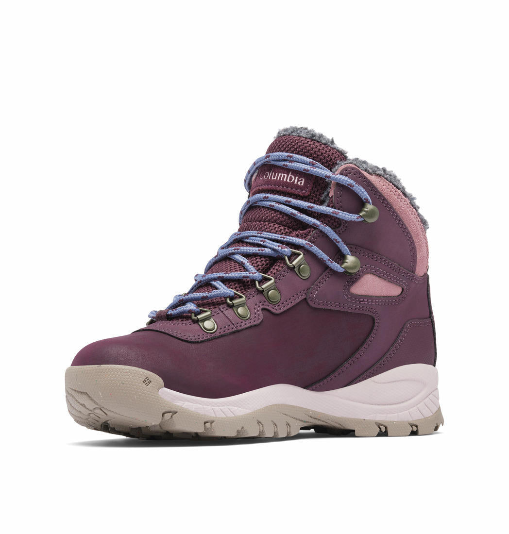 A Women Wearing Columbia Women Red NEWTON RIDGE WP OMNI-HEAT II