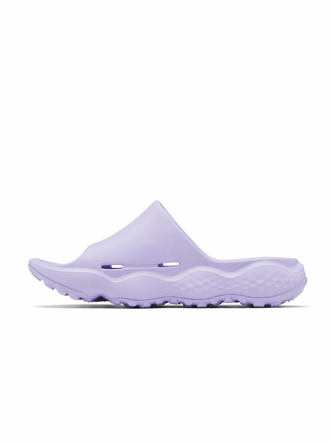 A Women Wearing Columbia Women Purple THRIVE REVIVE