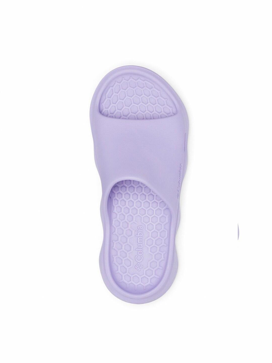 A Women Wearing Columbia Women Purple THRIVE REVIVE