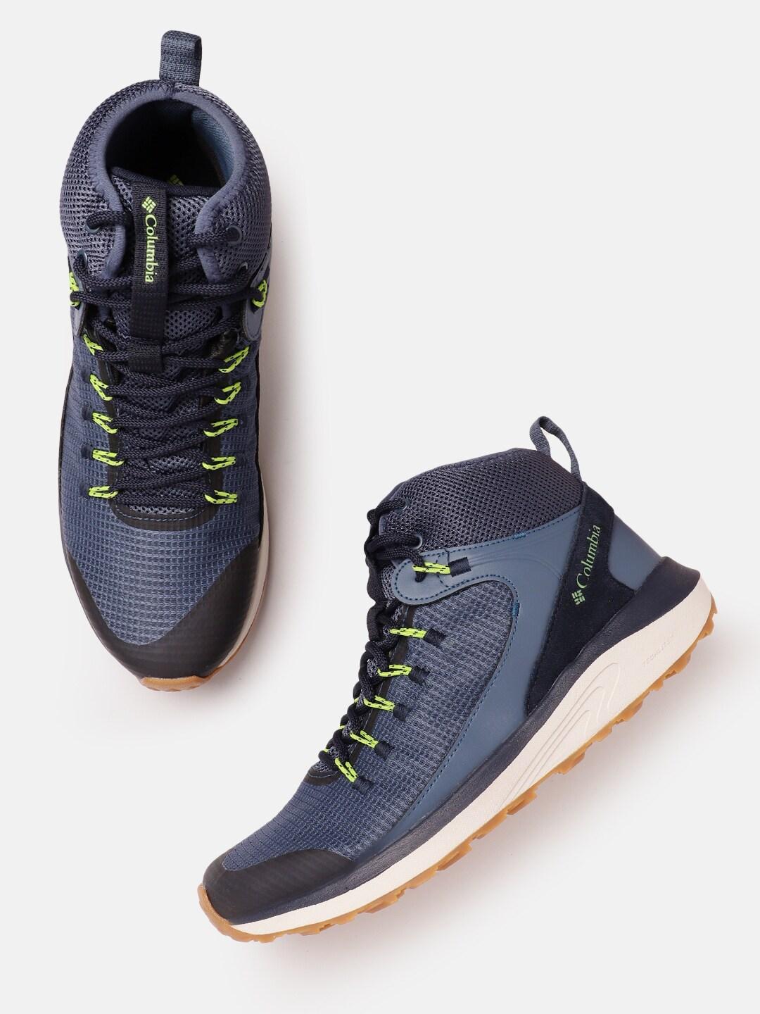A Men Wearing Columbia Men Navy Blue TRAILSTORM MID WATERPROOF