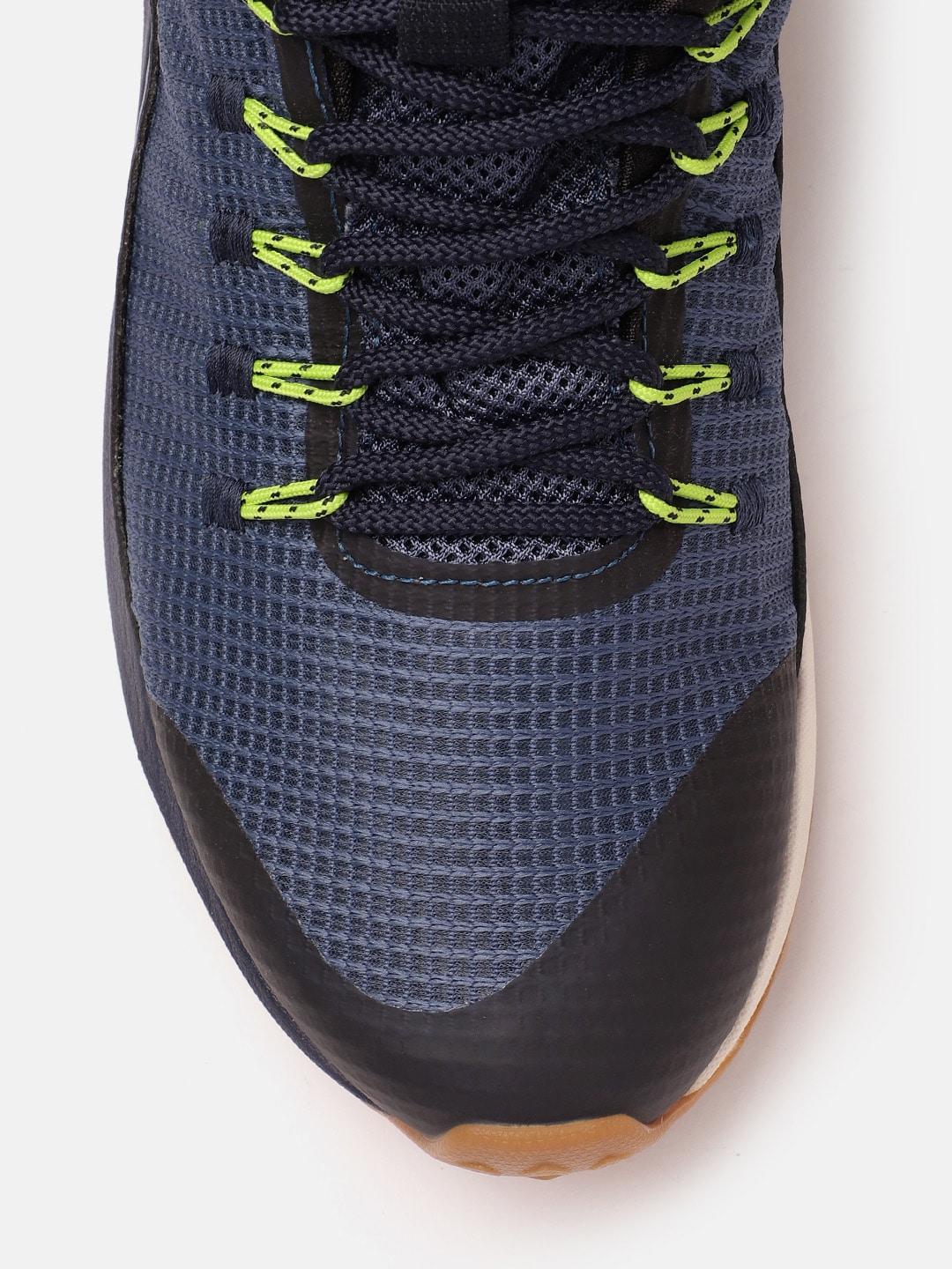 A Men Wearing Columbia Men Navy Blue TRAILSTORM MID WATERPROOF