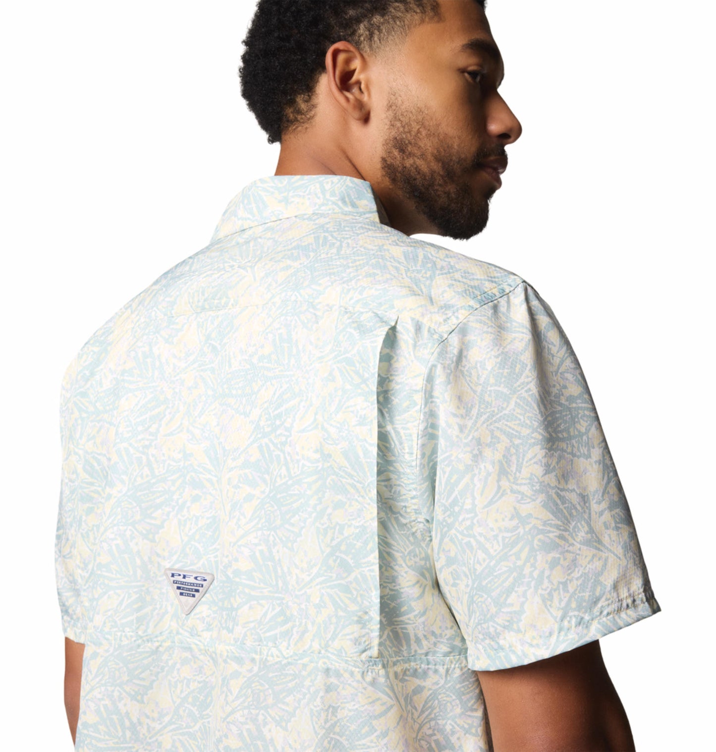 A Men Wearing Columbia Men Yellow Super Slack Tide Camp Shirt (Sun Protection)