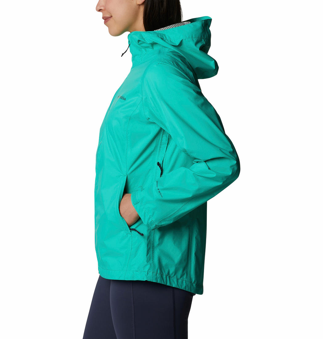 A Women Wearing Columbia Women Green EvaPOURation Jacket Waterproof