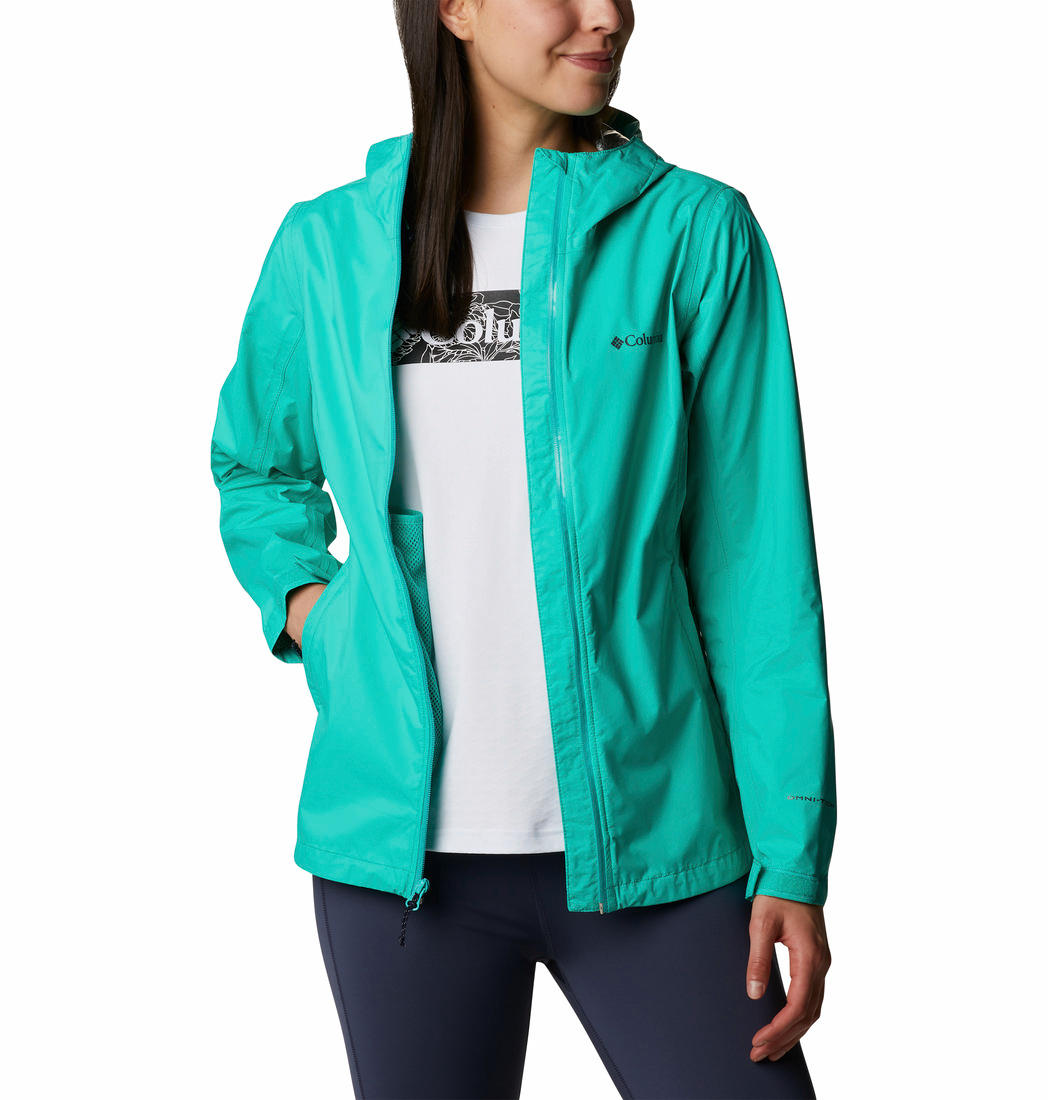 A Women Wearing Columbia Women Green EvaPOURation Jacket Waterproof