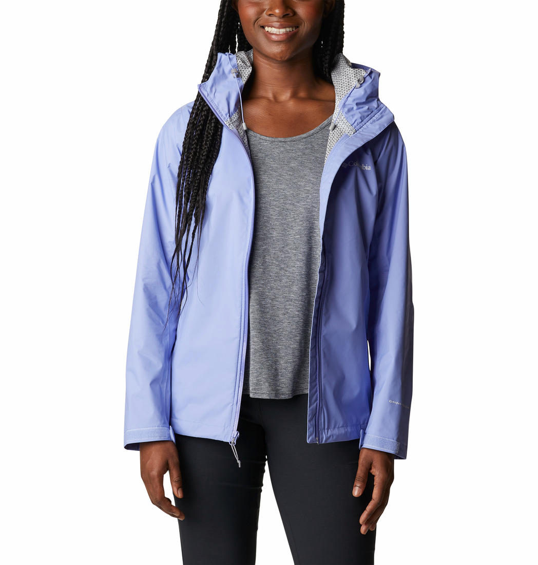 A Women Wearing Columbia Women Purple EvaPOURation Jacket Waterproof