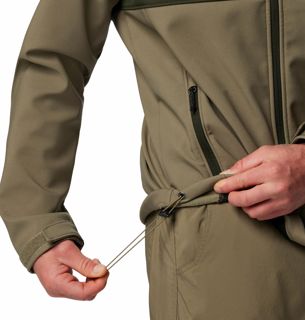 A Men Wearing Columbia Men Green Ascender Softshell Jacket