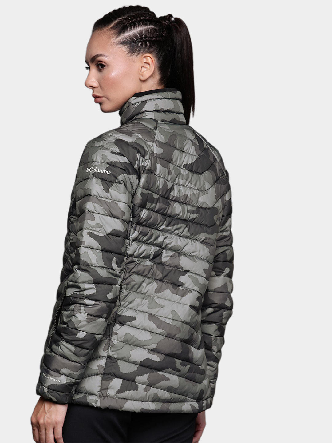 A Women Wearing Columbia Women Black Powder Lite Jacket