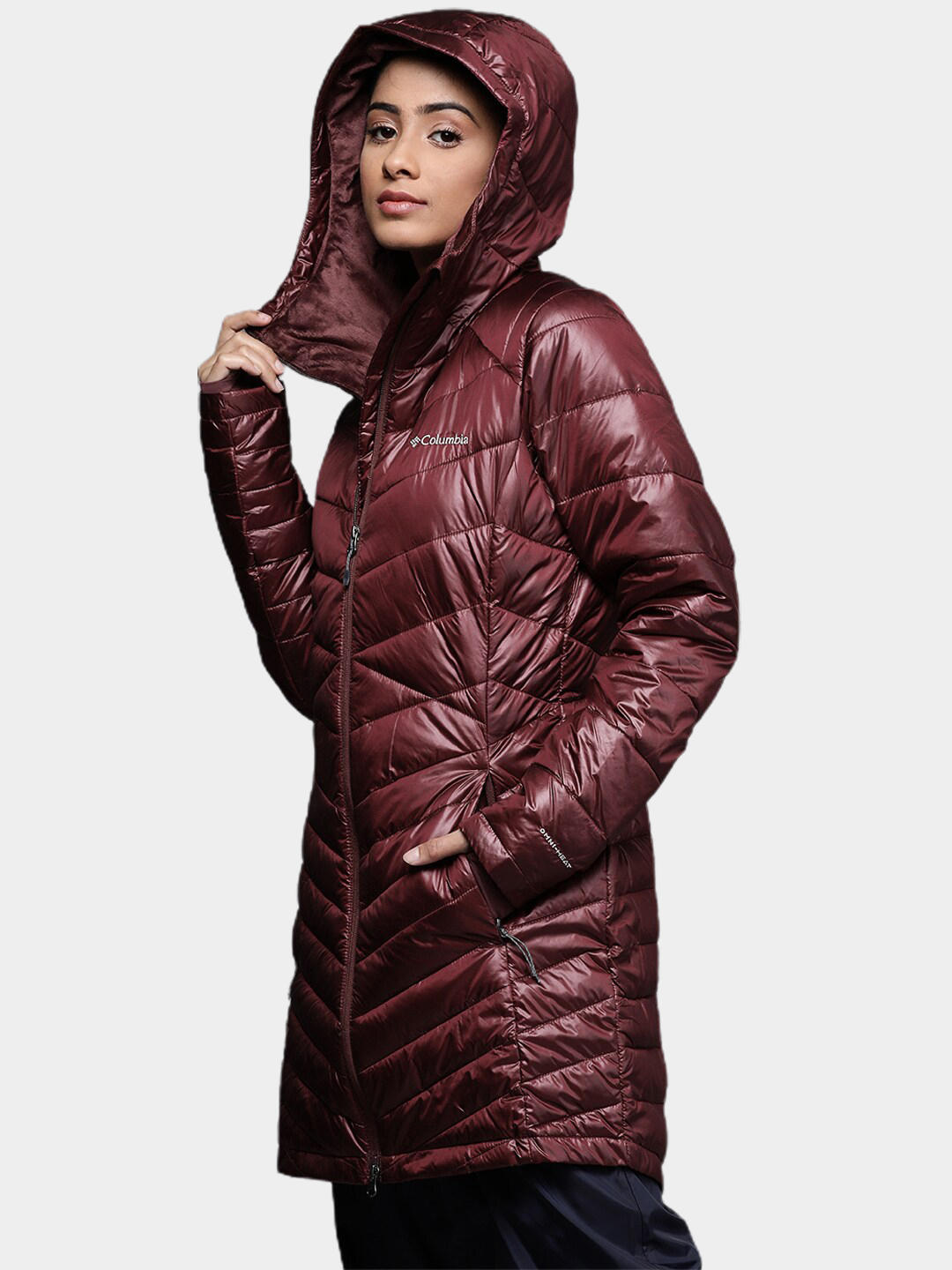 A Women Wearing Columbia Women Maroon Joy Peak Mid Jacket