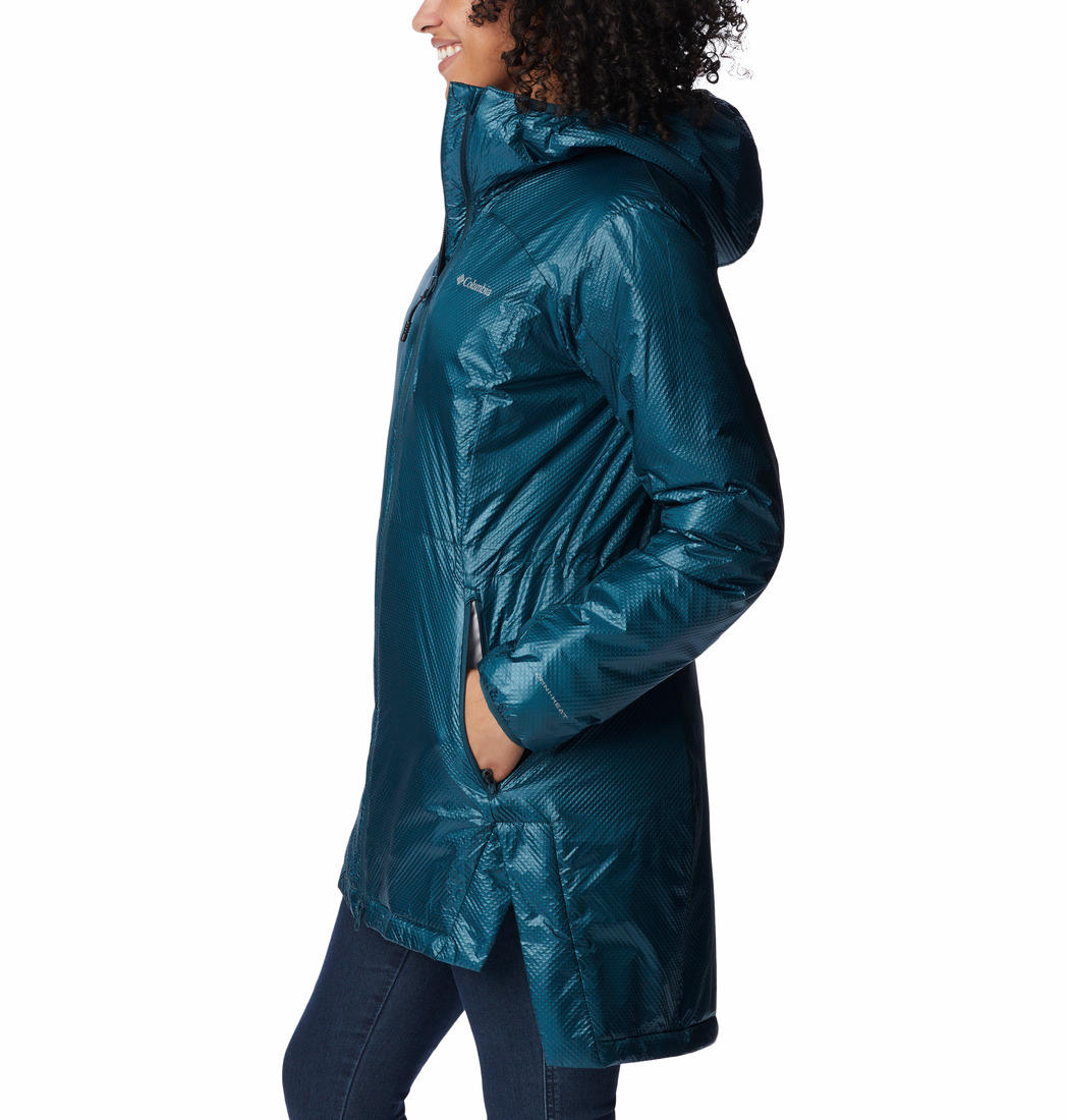 A Women Wearing Columbia Women Blue Arch Rock Double Wall Elite Mid Jacket