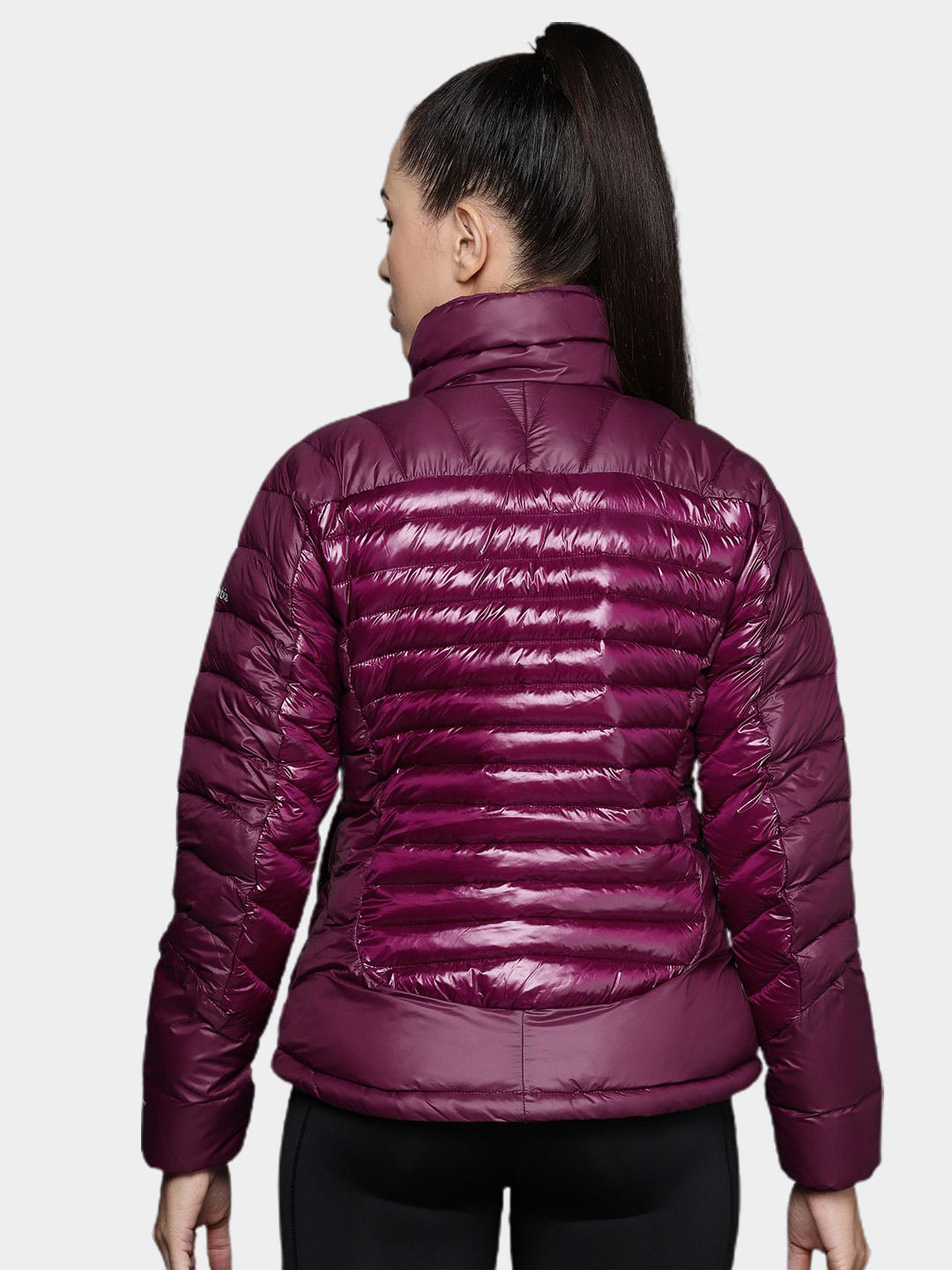 A Women Wearing Columbia Women Purple Labyrinth Loop Jacket