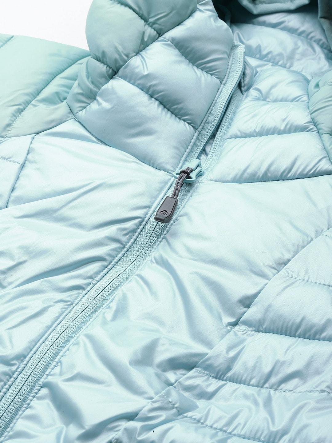 A Women Wearing Columbia Women Blue Labyrinth Loop Hooded Jacket
