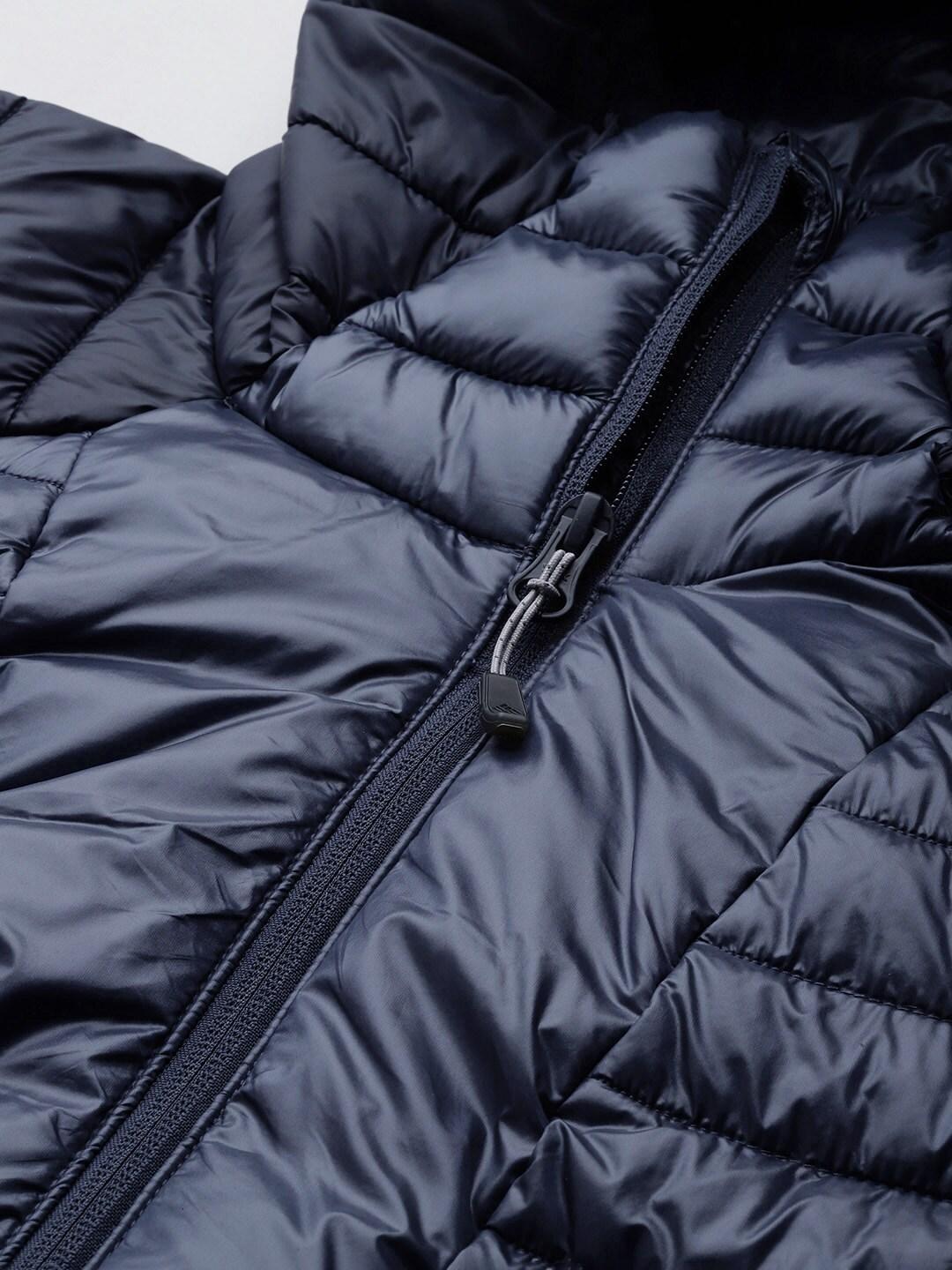 A Women Wearing Columbia Women Navy Blue Labyrinth Loop Hooded Jacket