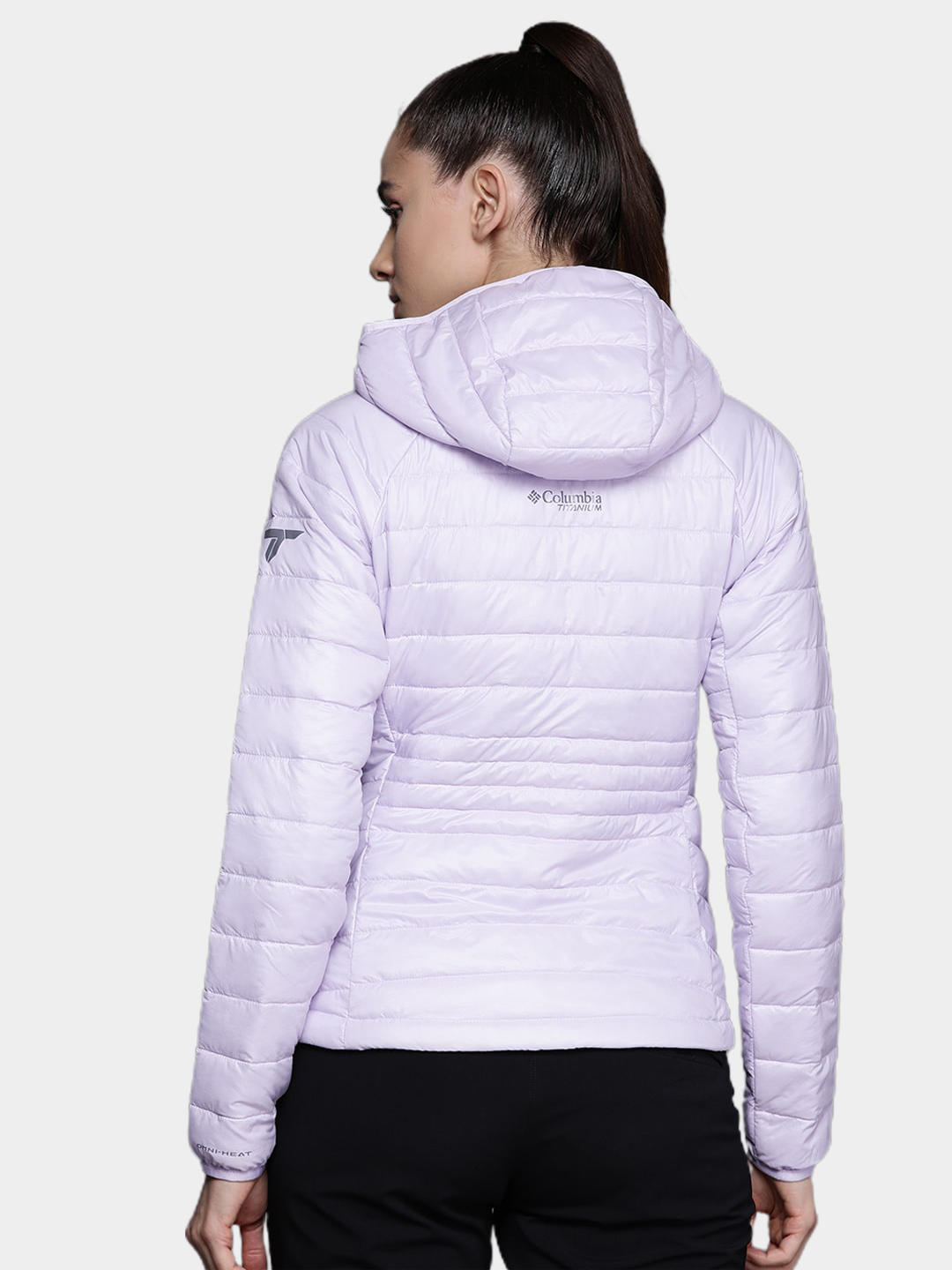 A Women Wearing Columbia Women Purple Platinum Peak Hooded Jacket