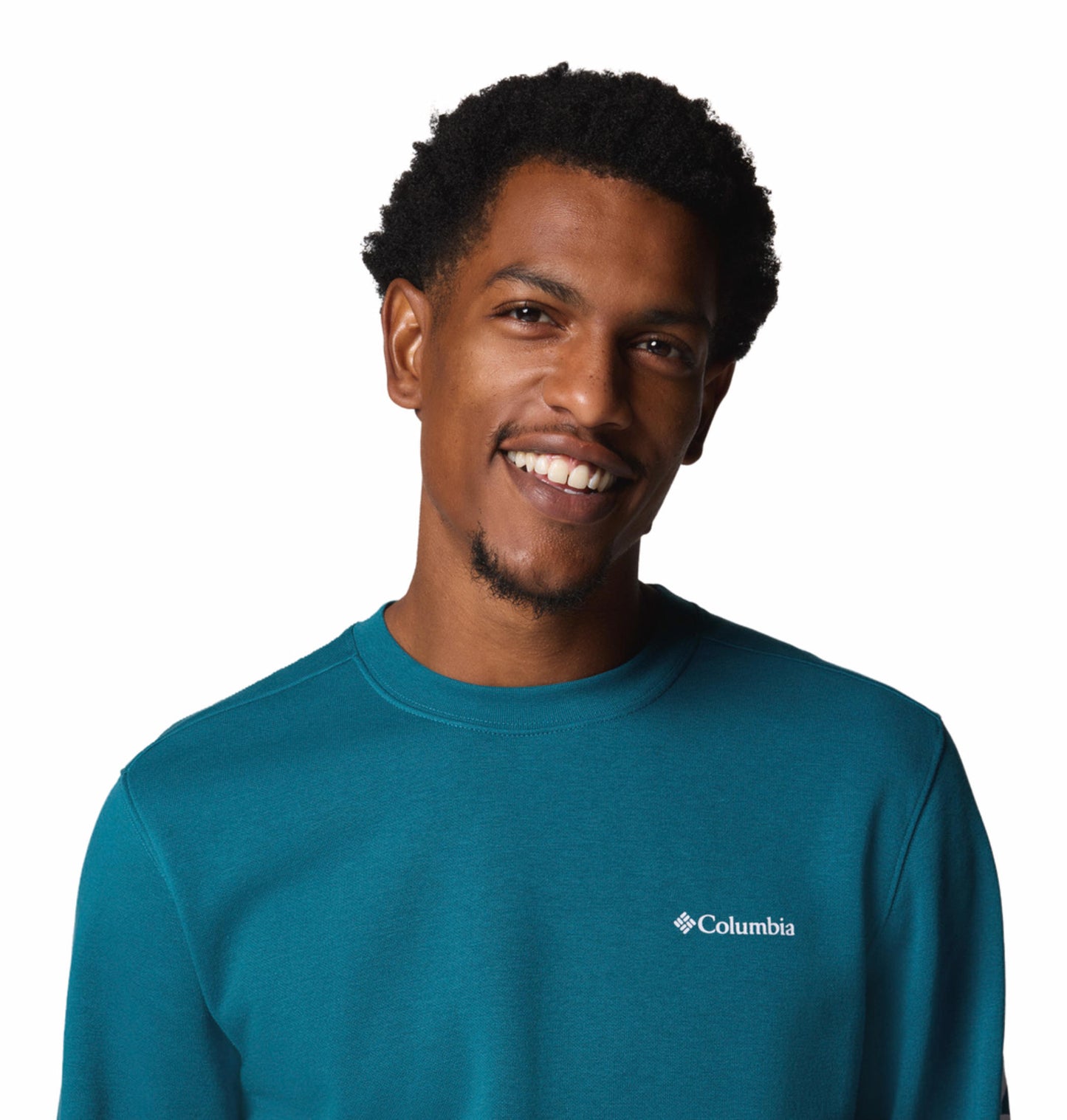 A man wearing a blue long-sleeved Columbia crew pullover sweatshirt.