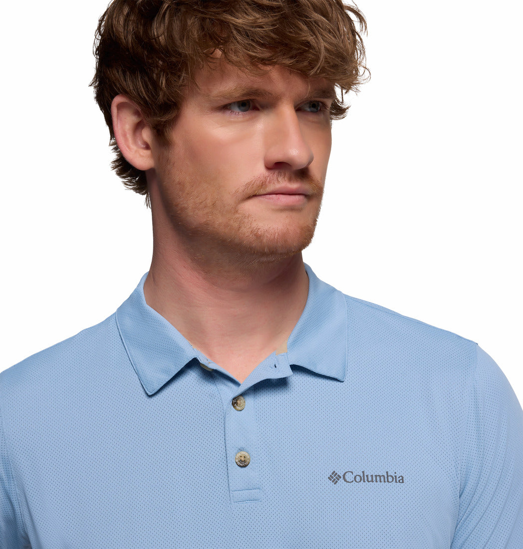 A Men Wearing Columbia Men Blue Tech Trail Utility Polo (Sun Protection)