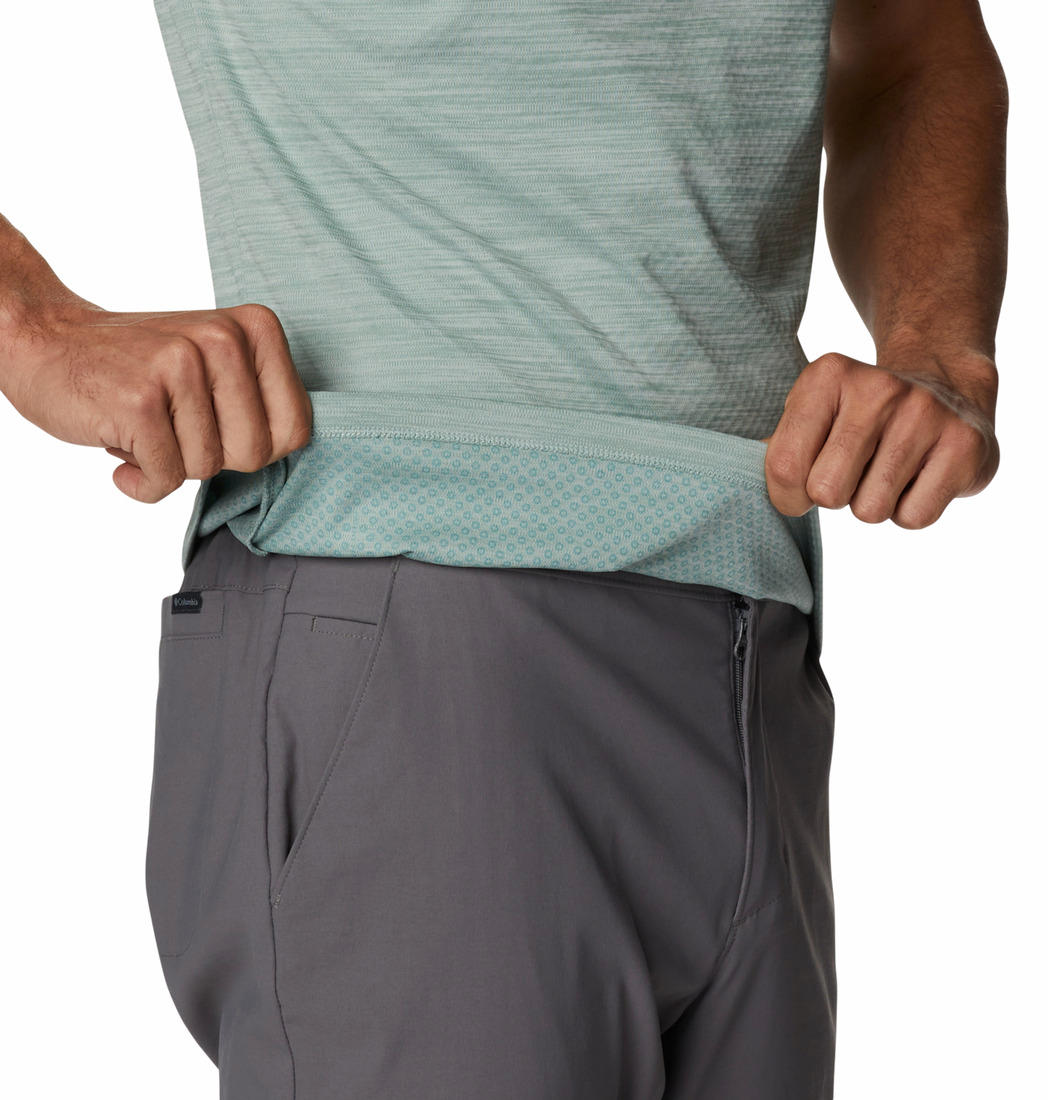 A Men Wearing Columbia Men Green Zero Rules Short Sleeve Graphic Shirt (Sun Protection)