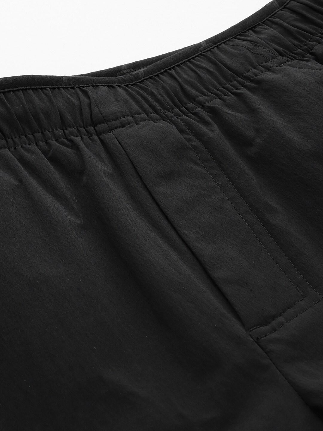 A Men Wearing Columbia Men Black M Titan Pass Lightweight Pant (Sun Protection)