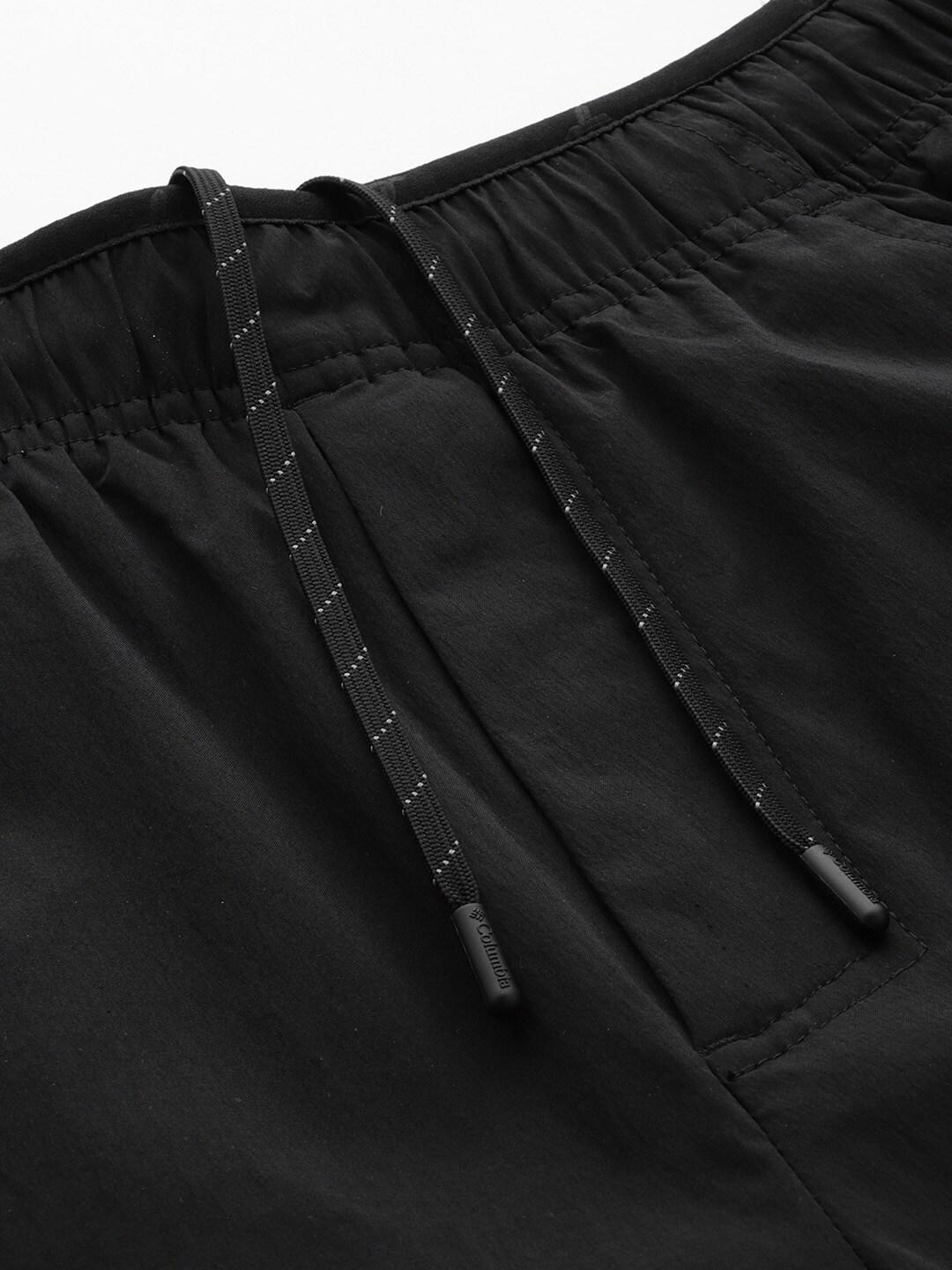 A Men Wearing Columbia Men Black M Titan Pass Lightweight Pant (Sun Protection)