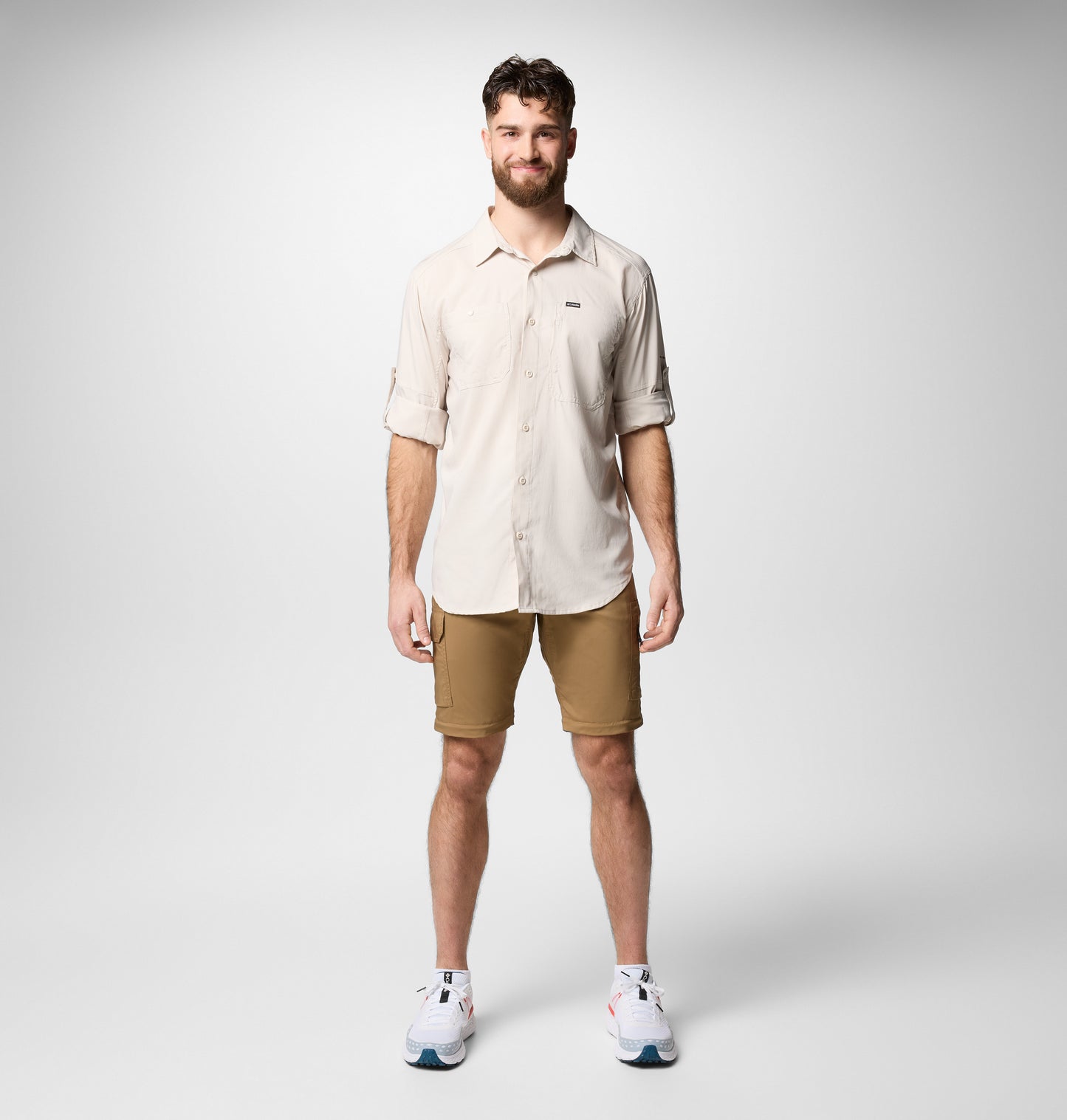 A Men Wearing Columbia Men Brown Silver Ridge Utility Convertible Pant (Sun Protection)