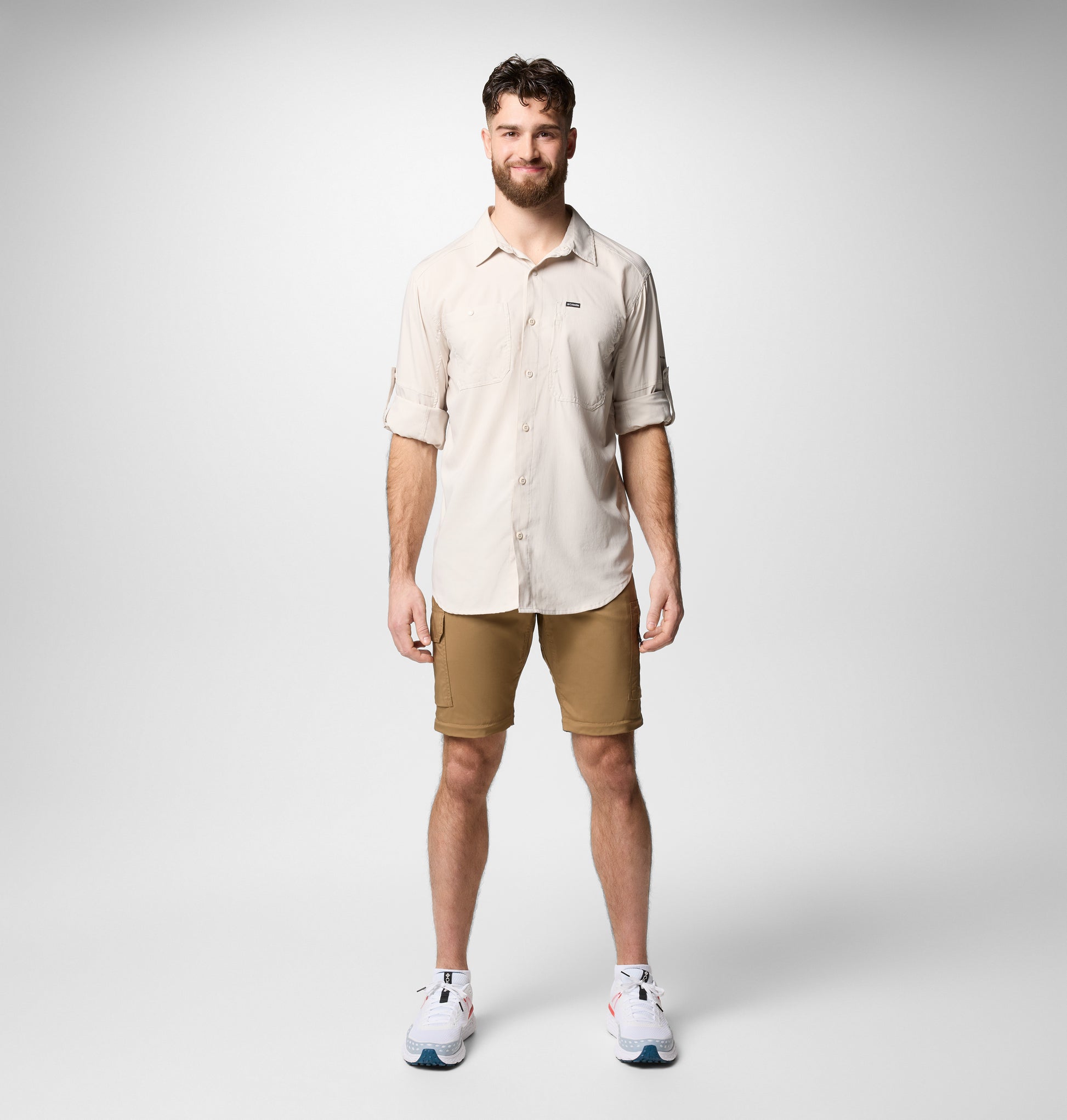 A Men Wearing Columbia Men Brown Silver Ridge Utility Convertible Pant (Sun Protection)