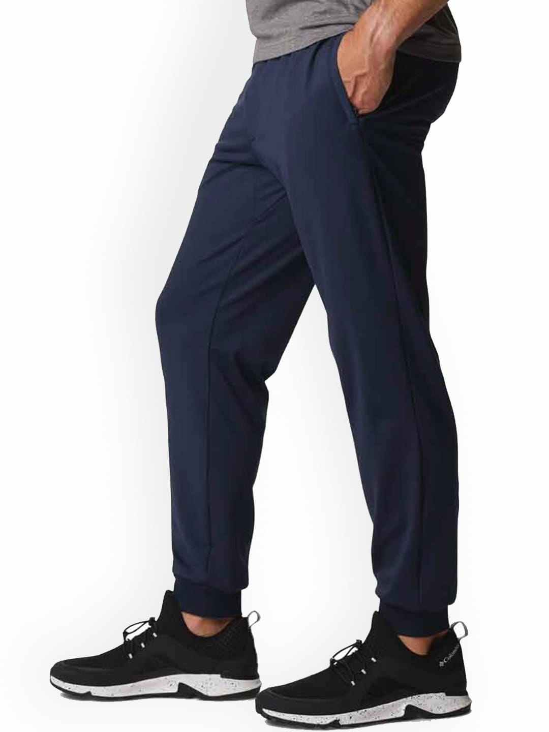 A Men Wearing Columbia Men Blue Tech Trail Knit Jogger