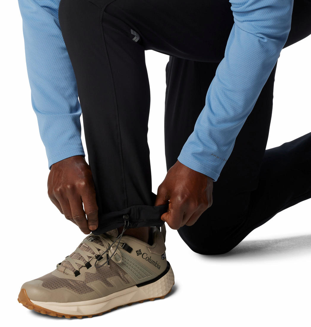 A Men Wearing Columbia Men Black Triple Canyon Pant II (Sun Protection)