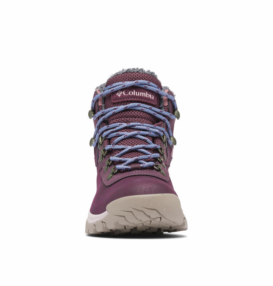 A Women Wearing Columbia Women Red NEWTON RIDGE WP OMNI-HEAT II