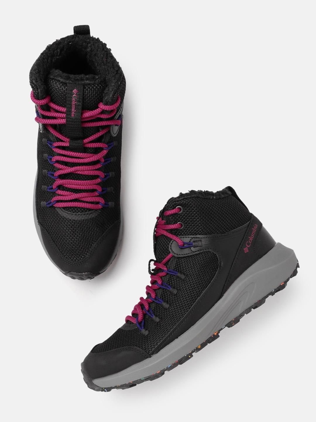 A Women Wearing Columbia Women Black TRAILSTORM MID WATERPROOF OMNI HEAT